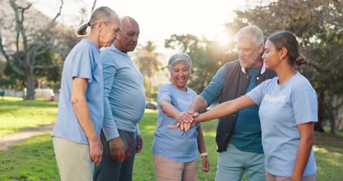 People, volunteer and huddle in park with smile for teamwork, collaboration and outreach program