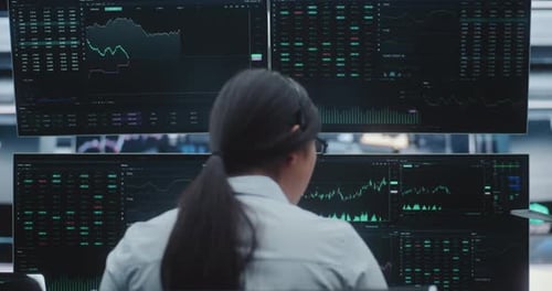 Professional Trader Operates in Vast Innovative Stock Exchange Hub