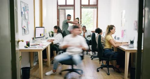 4k video footage of a group of young businesspeople working together modern office