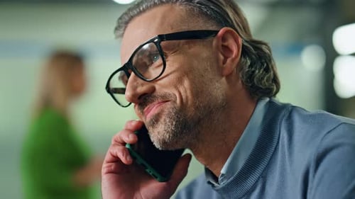 Portrait Smiling Businessman Calling Smartphone in Office. Happy Successful Entrepreneur Having Mobi