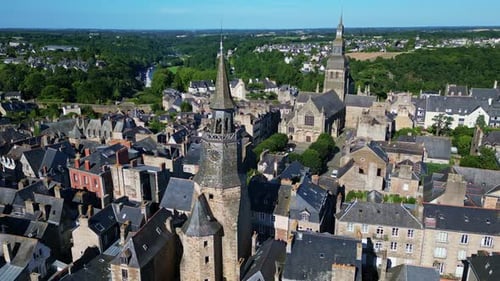 Receding aerial movement from the Tour de l'Horloge or Clock Tower and Saint Sauveur basilica, Dinan