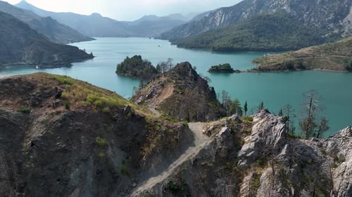 Aerial View Paddleboarding Through the Green Canyon People Swimming and Enjoying the Summer