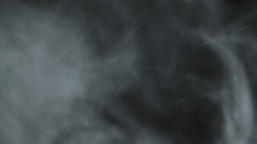 Swirling Gray Smoke on Dark Background