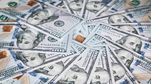 Swirling Pile of One Hundred Dollar Bills