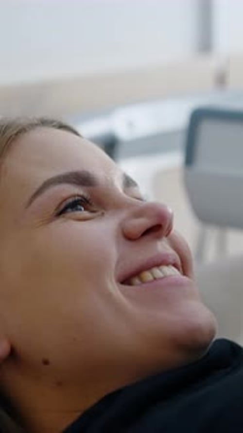Happiness on the smiling face of a woman at ultrasonic pregnancy check up.