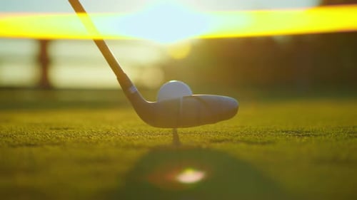 Slow Motion Golf Sport Concept Golfer Hitting Golf Ball to Hole for Winner in Golf Course is