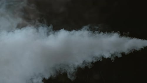 Ethereal Smoke Cloud Drifting across Dark Background