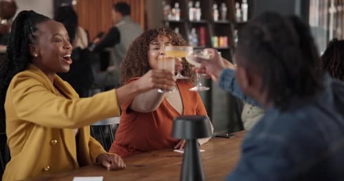 Cheers, friends and laughing in restaurant, group and bonding for success