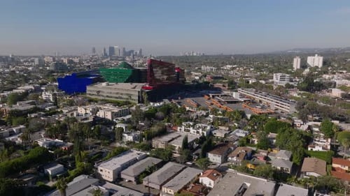 Aerial Slide and Pan Footage of Colour Buildings of Pacific Design Center Modern High Rise Buildings