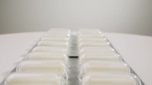 Pills and Vitamins Macro Close Up View of Womans Hands Holding Plenty of Different Drugs Painkillers