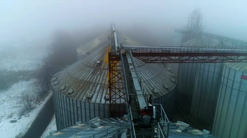 Grain Silos on a Foggy Winter Day