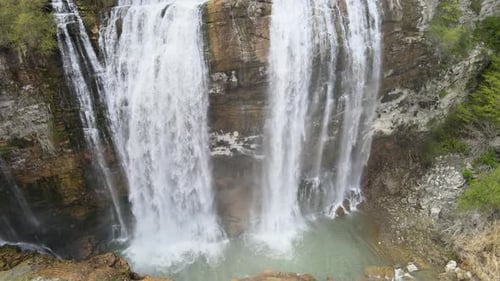 Majestic Waterfall Cascading Through a Lush Landscape