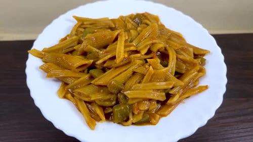 Indian Style Well Cooked Penne Pasta With Capsicums