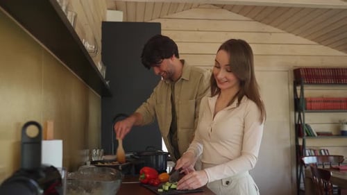 Happy Couple Cooking Together in Cozy Kitchen
