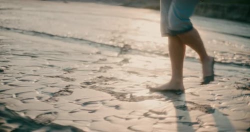 Man Walking on Dry Earth River Alone Man Footsteps Footprints