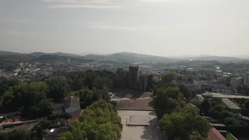 Flying Towards Guimaraes Castle, Portugal, Cityscape View, Aerial