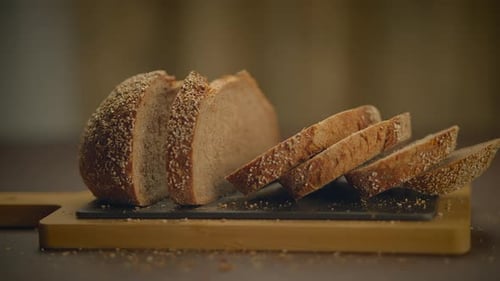 Slices of Whole Grain Bread on Cutting Board