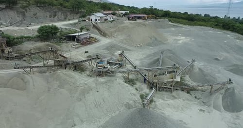 Aerial view of a quarry with machinery, Indonesia.