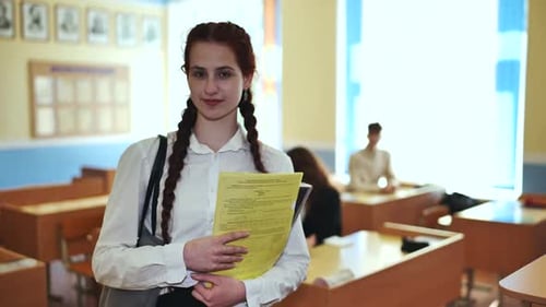 Portrait of a High School Girl with Notebooks
