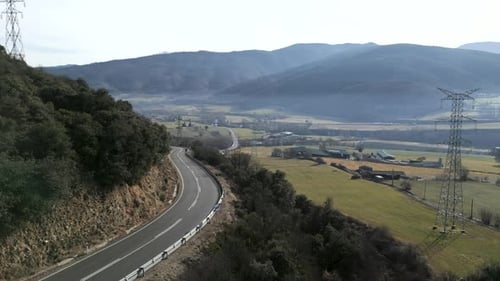 Drone View of a Road Between Valleys
