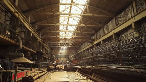 Large steel structure factory. Big factory warehouse hangar with metal structures.