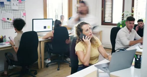 4k video footage of a group of young businesspeople working together modern office