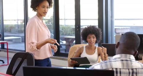 Business team colleagues discussing work in office