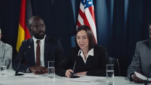 Press Conference with Flags and Corporate Representatives