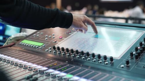 Sound Engineer Works at the Event. DJ Is Working at the Disco
