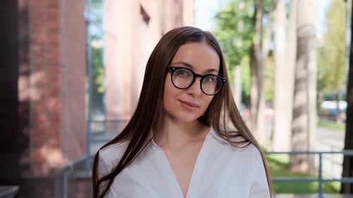 Young Woman with Glasses Close-up Portrait
