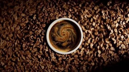 Coffee Beans Swirling Around a Cup Animation