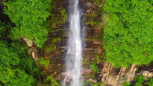 A Beautiful Waterfall in the Mountains Among the Jungle