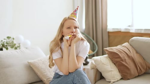 Unhappy lonely sad woman celebrates alone her birthday party