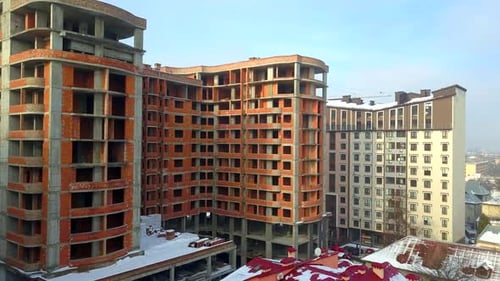Aerial View of Multistorey High Apartment Building Under Construction in a City