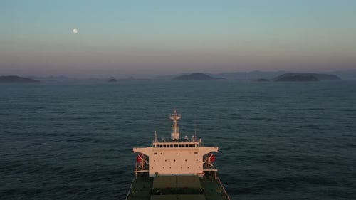 4K(24fps) Fly above panamax size bulk carrier vessel.