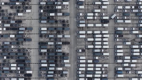Aerial view of parked vans in rows, Italy.