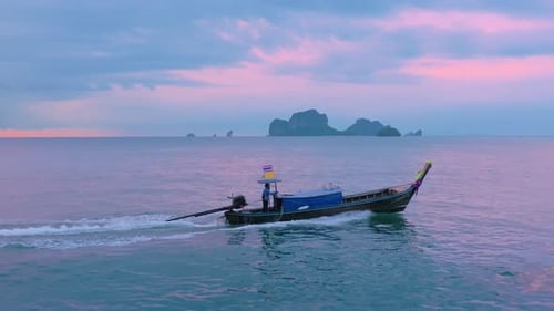 Stunning Aerial View of LongTail Boat at Sunset in Krabi Thailand