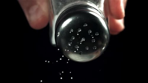 Salt Flies Out of the Salt Shaker Filmed on a Highspeed Camera at 1000 Fps