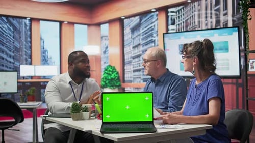 Office Meeting with Laptop Green Screen Display