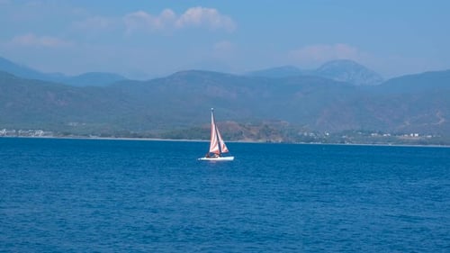 Fishing Sails Boat Glide on Waves