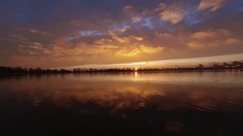 Colorful Timelapse of a Red Sunset Over a Lake Privacy in Nature