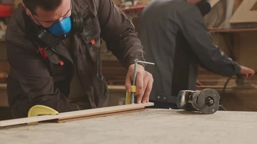Carpenters Working in Workshop