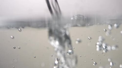 Clear Water Stream on Light Background