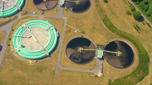 Aerial view of modern water cleaning facility at urban wastewater treatment plant. Purification proc