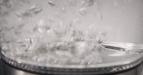 Bubbling Water in a Clear Container