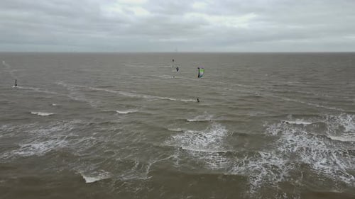 Kite surfers on windy day in autumn UK Clacton on sea