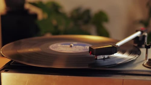 Vintage Record Player Playing Music on Vinyl