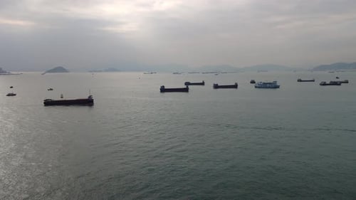 Cargo barges at Victoria Harbour Kowloon Peninsula Hong Kong