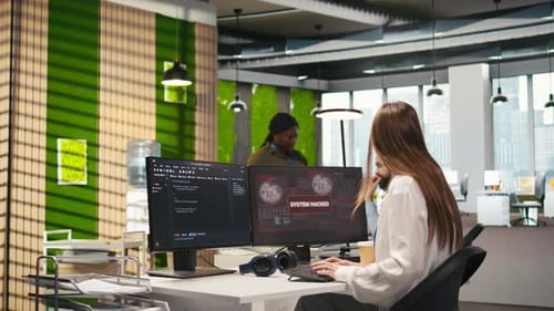 Cybersecurity Team Investigating System Breach in Office