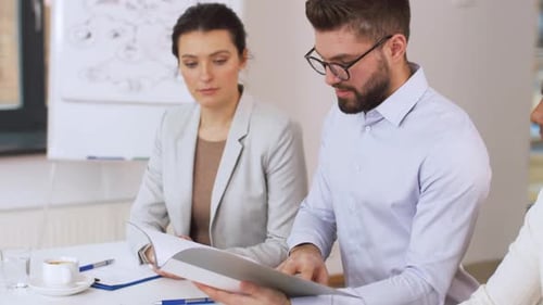 Business meeting with diverse group in office